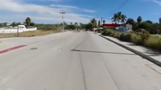 LOS CABOS MEXICO-2019: Traveling Down A Dirty Road And Passing A Gas Station