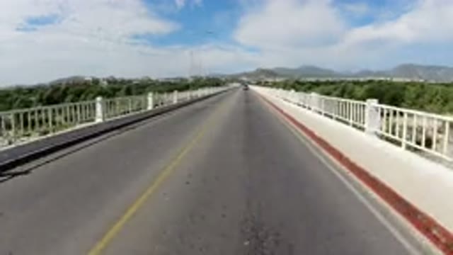 LOS CABOS MEXICO-2019: Road On Bridge In Sunny Day In Landscape Full Of Trees