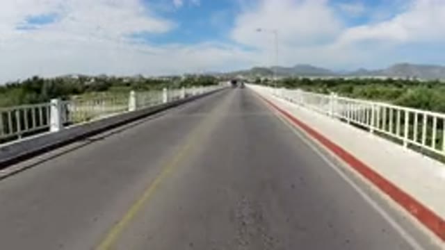 LOS CABOS MEXICO-2019: Traveling On A Bridge On A Vehicle With Few Wranglers And