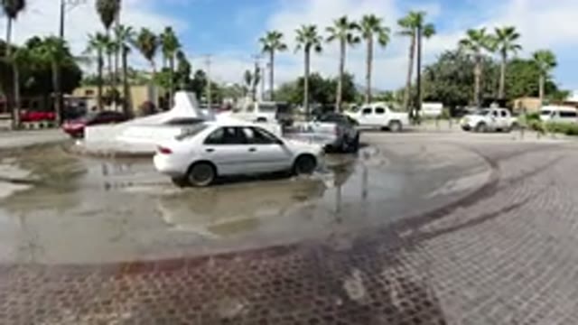 LOS CABOS MEXICO-2019: Several Different Vehicles Are Navigating A Roundabout In