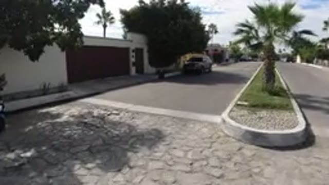 LOS CABOS MEXICO-2019: View From A Vehicle Traveling Slowly On A City Street