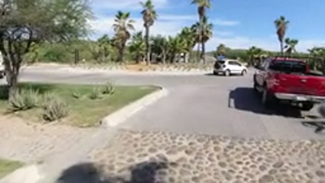 LOS CABOS MEXICO-2019: Wrangler Driving Around A Roundabout On A Sunny Day