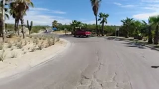 LOS CABOS MEXICO-2019: Wrangler and Truck Traveling on Ring Roadside