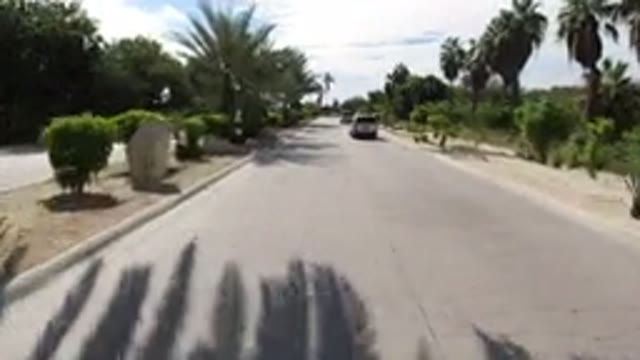 LOS CABOS MEXICO-2019: A View Of A Wide Road With A Wrangler Ahead On A Sunny Day
