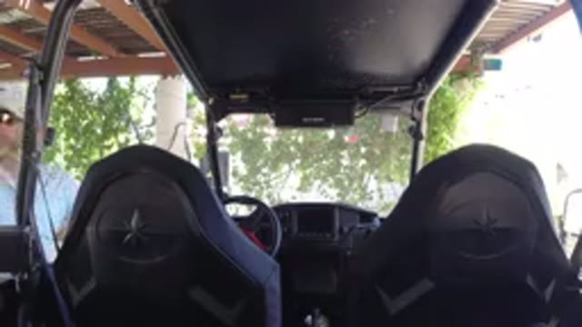 LOS CABOS MEXICO-2019: Middle-Aged Man With Sunglasses And Hat Gets Into His Vehicle