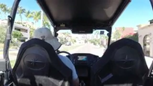 LOS CABOS MEXICO-2019: Riding Back Seat In A Go-Kart On A Sunny Day Down The
