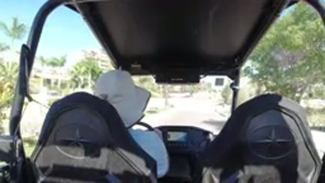 LOS CABOS MEXICO-2019: A Man In Hat Riding Wrangler In The Neighborhood In A