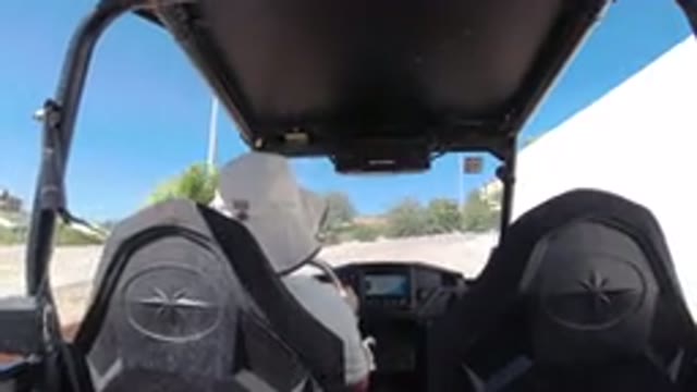 LOS CABOS MEXICO-2019: A Person Drives A Wrangler Between Some Country Houses