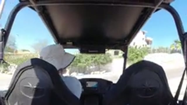 LOS CABOS MEXICO-2019: A Man Driving A Wrangler Alone On A Street In A Sunny Day