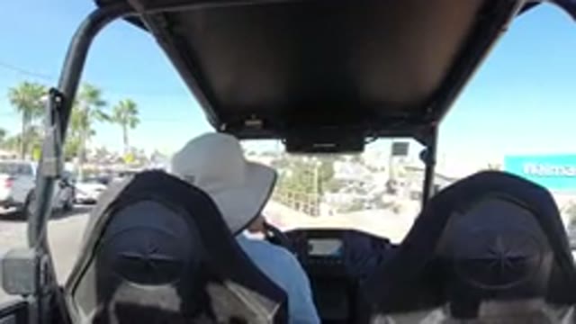 LOS CABOS MEXICO-2019: Driver Ride Backseat Golf Cart Driving Through Streets
