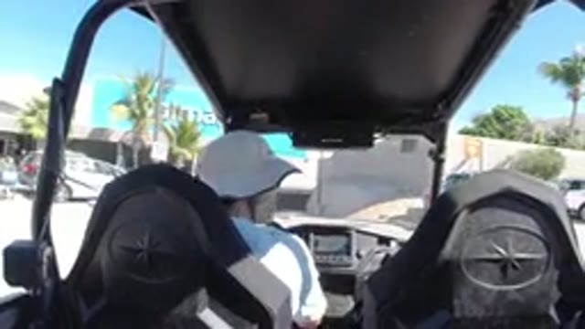 LOS CABOS MEXICO-2019: A Person Driving A Vehicle Through The Walmart Parking Lot
