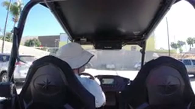 LOS CABOS MEXICO-2019: Guy With A Hat Parking Car In A Parking Lot