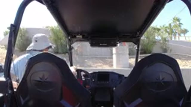 LOS CABOS MEXICO-2019: Person Wearing A Hat Gets Out Of Vehicle To Check The Window