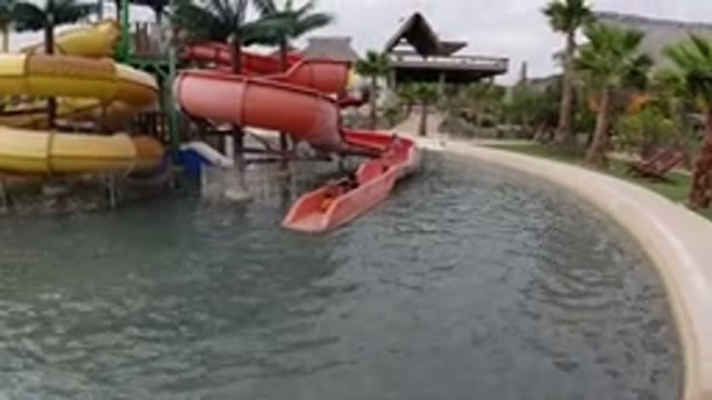 LOS CABOS MEXICO-2019: People Playing and Sliding on a Water Playground