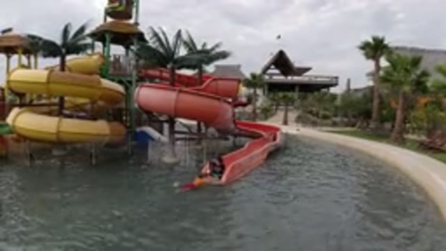 LOS CABOS MEXICO-2019: Kids Playing In Water Slide In A Theme Park With Pool And