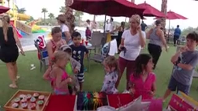LOS CABOS MEXICO-2019: Girls Playing In The Theme Park In Front Of The Shops