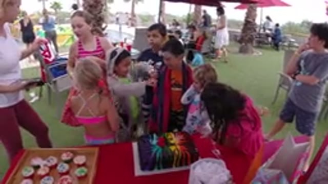 LOS CABOS MEXICO-2019: Kids In Swimsuits Playing And Talking To Adults At A Club