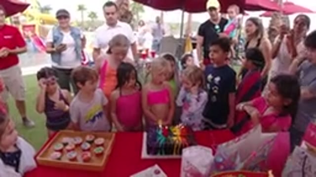 LOS CABOS MEXICO-2019: Girl Celebrating Birthday Blowing Candle Kids Singing