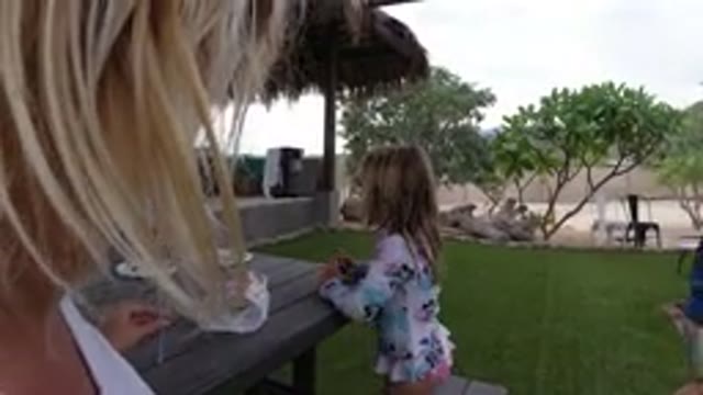 LOS CABOS MEXICO-2019: Children Playing At A Picnic Table And Interacting With A