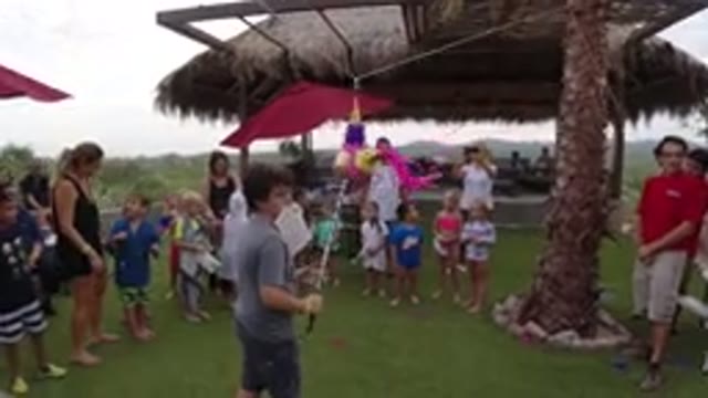 LOS CABOS MEXICO-2019: Children At A Birthday Party Interact With A Pie-Ta