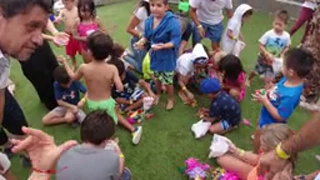 LOS CABOS MEXICO-2019: Kids With Their Parents Playing A Game