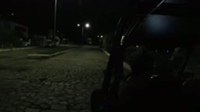 LOS CABOS MEXICO-2019: A Man Stands By A Wrangler In A Dark Area
