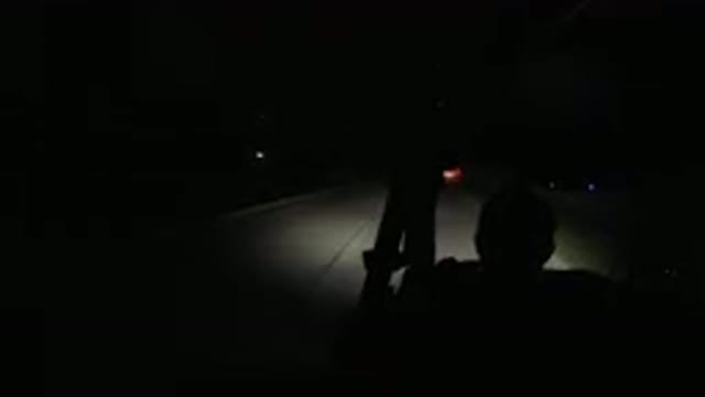 LOS CABOS MEXICO-2019: Over The Shoulder View Of A Vehicle Driving At Night
