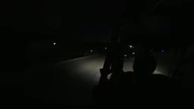 LOS CABOS MEXICO-2019: Human Drives Golf Cart in the Dark With Only Headlights