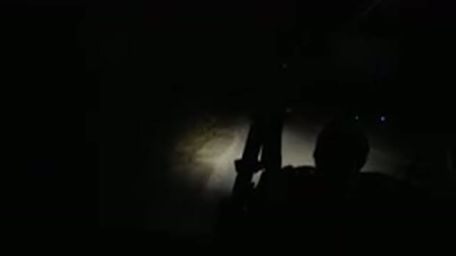 LOS CABOS MEXICO-2019: Golf Wrangler Driving Along Road at Night with Taillights