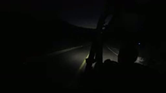 LOS CABOS MEXICO-2019: Someone Is In A Vehicle Driving In The Dark At Night