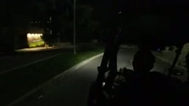LOS CABOS MEXICO-2019: Two People Driving Vehicle In The Night With Some Trees