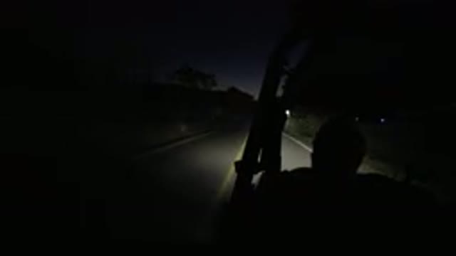 LOS CABOS MEXICO-2019: Riding In Vehicle On Straight Road With Headlights On At Night