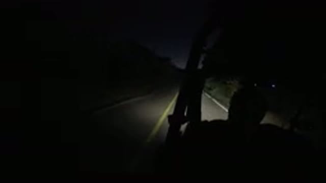 LOS CABOS MEXICO-2019: Smart Person Drives A Vehicle On The Road In The Dark