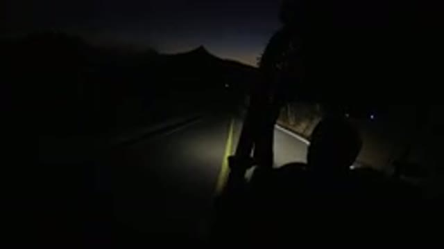 LOS CABOS MEXICO-2019: Man Rides Dune Buggy At Night Down A Paved Road