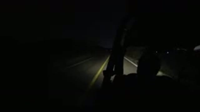 LOS CABOS MEXICO-2019: Someone Is Driving Their Motor Vehicle On The Road At Night