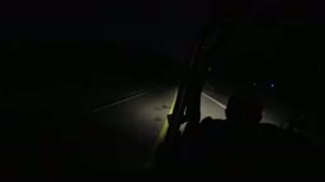LOS CABOS MEXICO-2019: Bus Driver Navigating Narrow Road in the Dark
