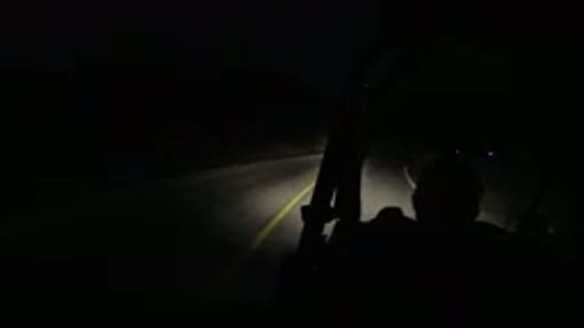 LOS CABOS MEXICO-2019: Driving On A Dark Empty Road After Sunset Road Bend