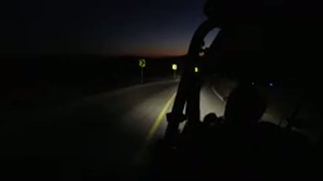 LOS CABOS MEXICO-2019: Golf-Wrangler Driving Down Highway After Sunset In The