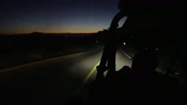 LOS CABOS MEXICO-2019: Man And His Friend Driving Through The Highway At Night