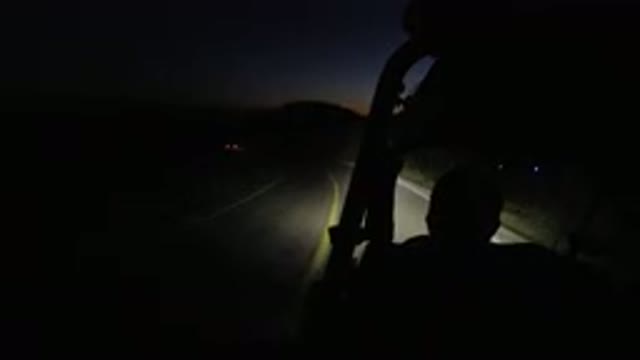 LOS CABOS MEXICO-2019: Dark Road Person Driving Small Wrangler Night Mountain In