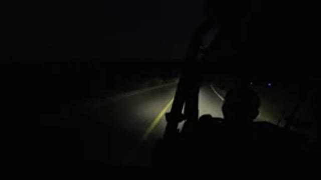 LOS CABOS MEXICO-2019: Man Driving A Vehicle At Night On A Completely Dark Road