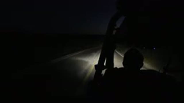 LOS CABOS MEXICO-2019: Driving Down A Darkened Road In A Fun Recreational Vehicle