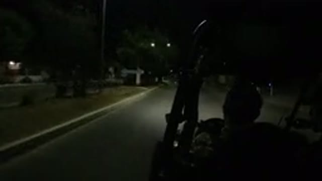 LOS CABOS MEXICO-2019: Military Jeep Driving On A Street In The Dark