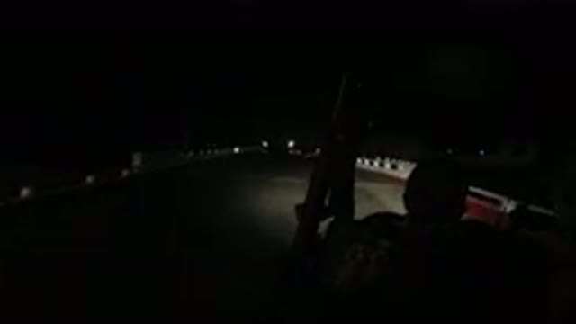 LOS CABOS MEXICO-2019: Man With Glasses Driving A Vehicle Down A Very Dark Road