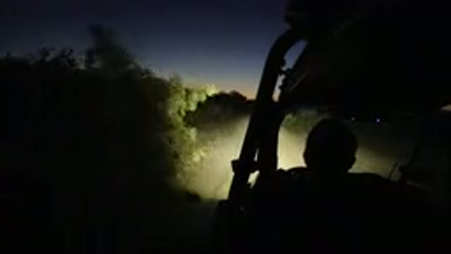 LOS CABOS MEXICO-2019: Camera Mounted On The Side Of A Jeep While Men Are Driving At Night
