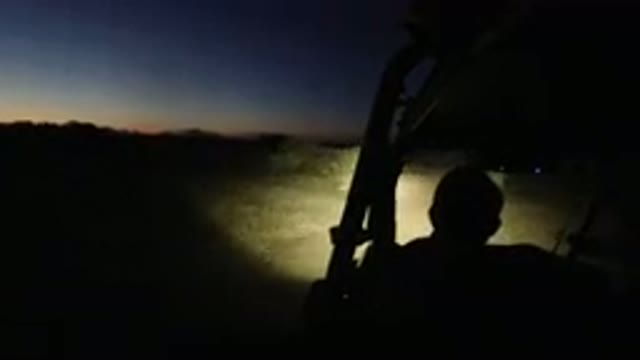 LOS CABOS MEXICO-2019: Man Driving Through The Desert Alone At Night With The