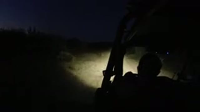 LOS CABOS MEXICO-2019: Two People Driving Vehicle Off-road In The Night With