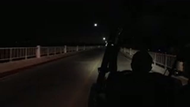 LOS CABOS MEXICO-2019: Vehicle Moves Down Two Lane Road At Night