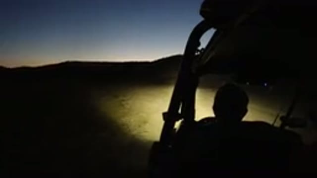 LOS CABOS MEXICO-2019: Someone Is Driving A Vehicle In The Dark Through A Rocky Path