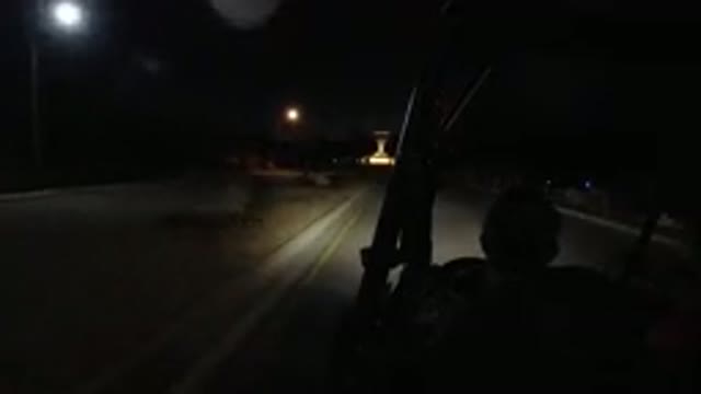 LOS CABOS MEXICO-2019: A Person Riding In A Wrangler Through A Wheel At Night